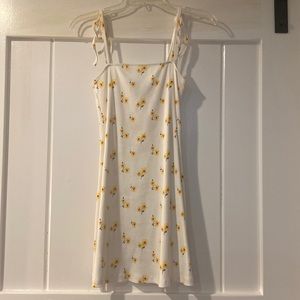 White floral dress with yellow flowers